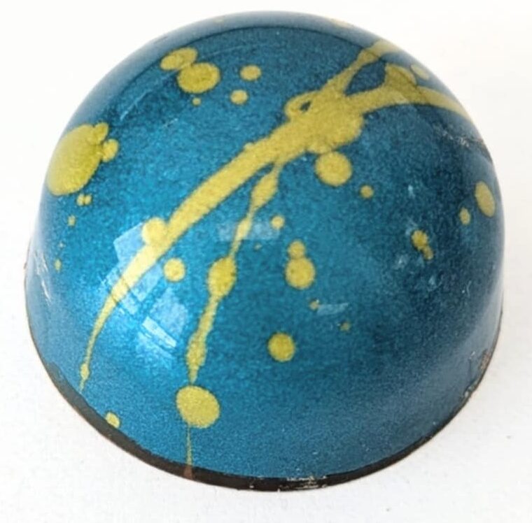 Lemon Cointreau - tangy lemon and cointreau wrapped in a 54% dark chocolate shell (contains alcohol)