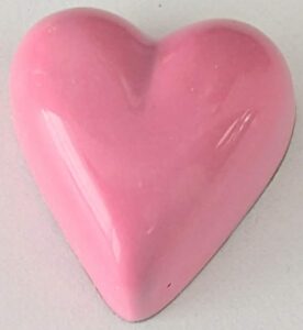 Cardamom ganache in a milk chocolate shell.